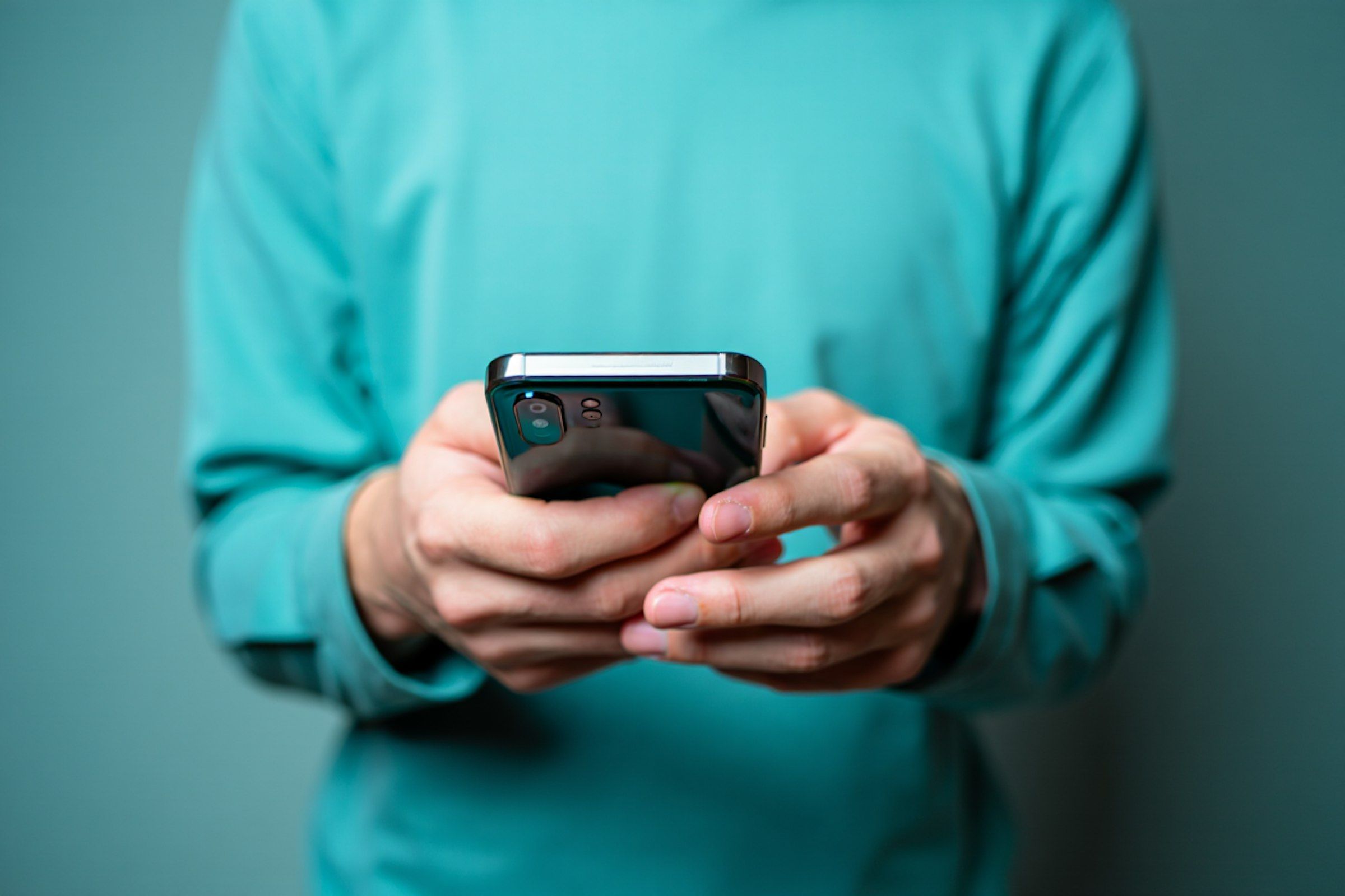 Person Holding Phone
