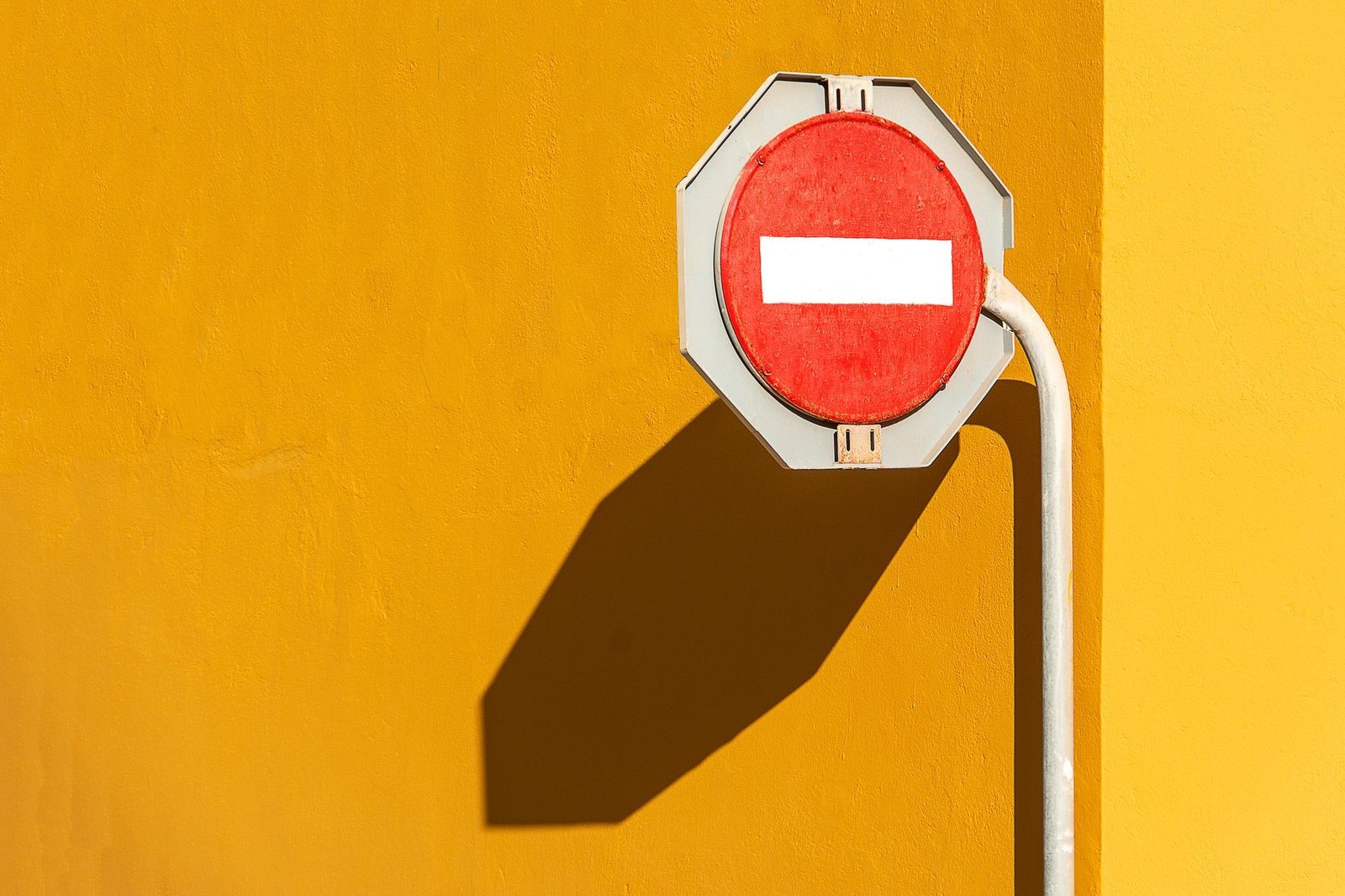 No entry sign on a yellow wall: Corral blocks unwanted traffic on managed devices