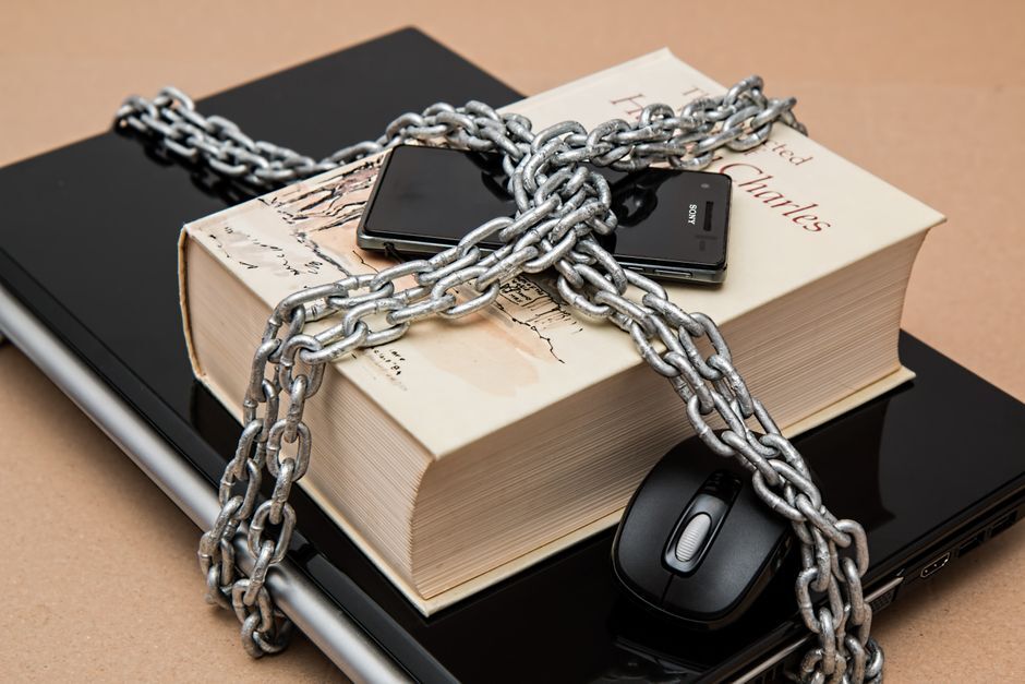 Conditional access and MDM on a secured laptop. Photo by Pixabay on Pexels