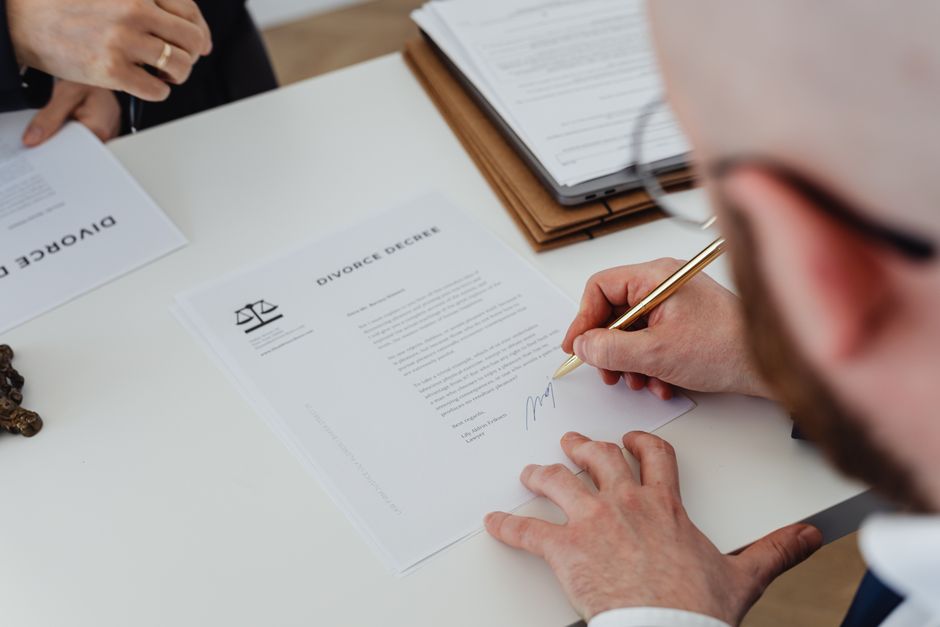 Employee signing a mobile device acceptable use policy at onboarding